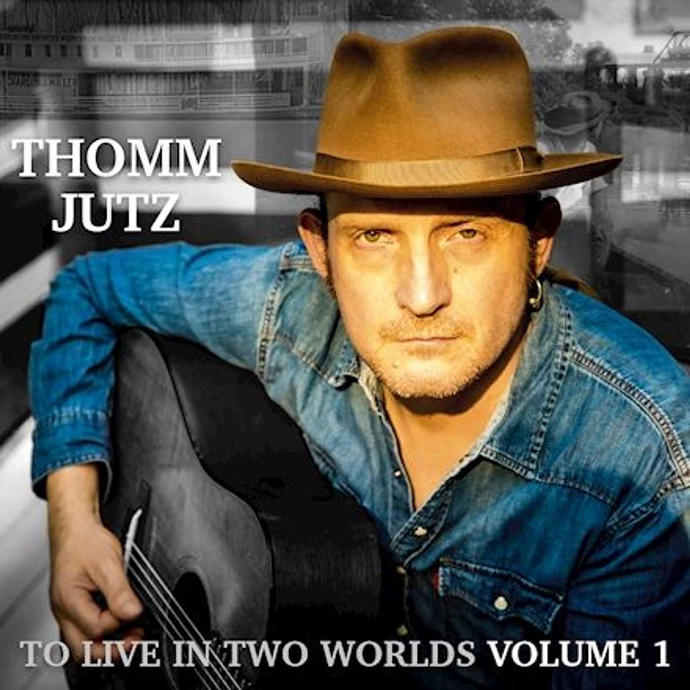Episode 125 American “cousin” Thomm Jutz visits to showcase his new two volume Grammy nominated album “To Live in Two Worlds”. episode artwork