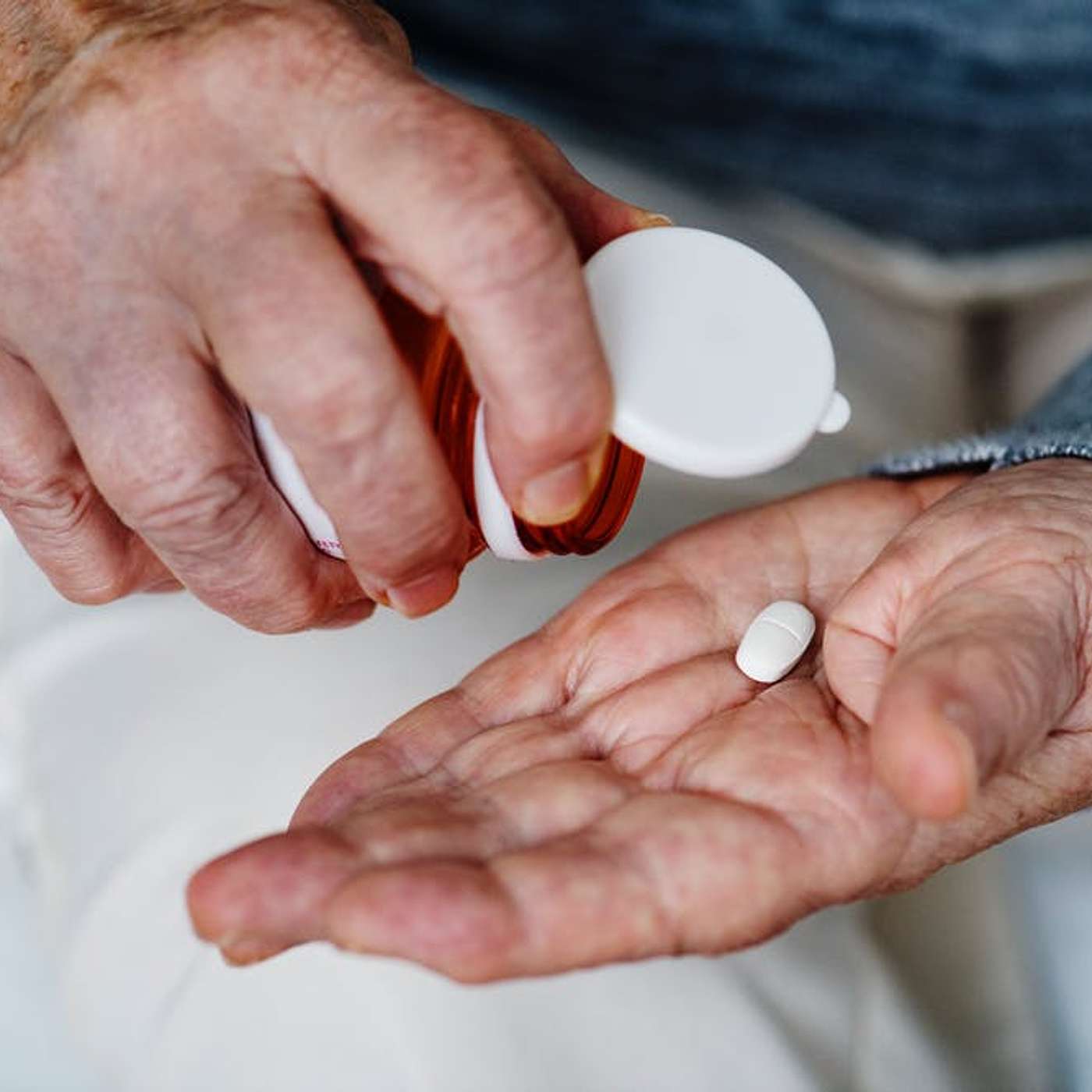 Opening a Medicine Bottle and Sorting Pills