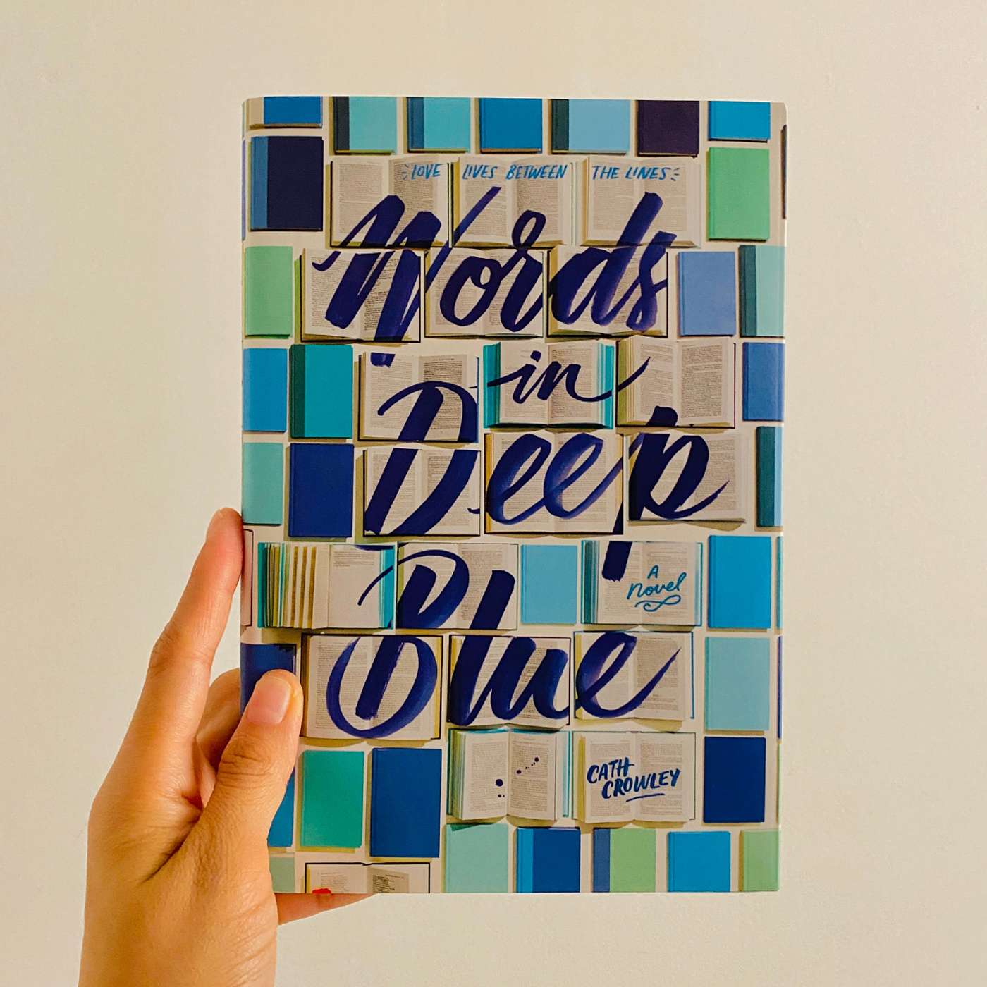 S6.E15 Book of the Month: WORDS IN DEEP BLUE