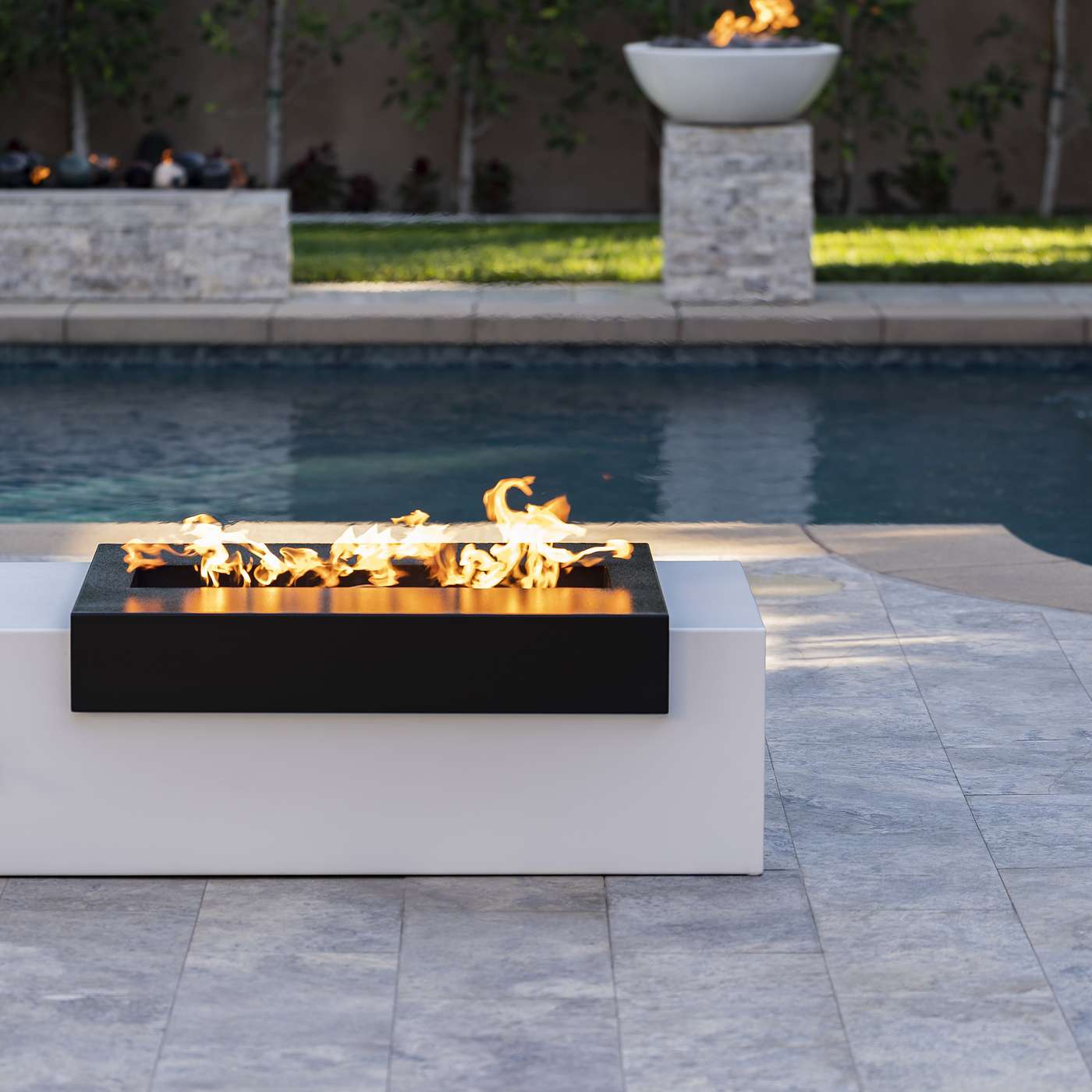 Designing the Vibe: Pairing Fire Features With Pool Style & Geometry