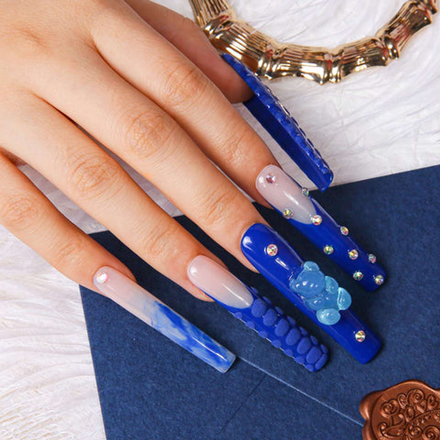 THE HIDDEN MEANING BEHIND BLUE FRENCH TIP NAILS: TIKTOK'S LATEST TREND EXPLAINED